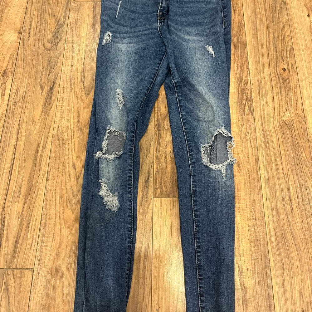 Distressed Blue Jeans